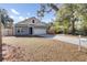 Inviting single-Gathering home with a two-car garage, a well-kept lawn, and ample driveway space at 409 Klein St, Walterboro, SC 29488