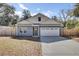 Charming single-Gathering home with a two-car garage and well-maintained front yard at 409 Klein St, Walterboro, SC 29488