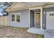 Inviting entryway features a covered porch and well-maintained landscaping at 409 Klein St, Walterboro, SC 29488