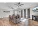 Living room featuring hardwood floors, neutral walls, comfortable seating, and natural light at 409 Klein St, Walterboro, SC 29488