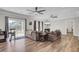 Spacious living room with sliding glass doors, wood floors, and comfortable seating at 409 Klein St, Walterboro, SC 29488