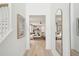Inviting foyer with wood floors that flows seamlessly to the open concept living spaces at 421 Grove End Rd, Moncks Corner, SC 29461