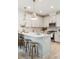 Bright kitchen featuring a central island with bar seating, pendant lighting, and stainless steel appliances at 421 Grove End Rd, Moncks Corner, SC 29461