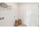 A clean and organized laundry room includes shelving for storage and woven baskets for a stylish touch at 421 Grove End Rd, Moncks Corner, SC 29461