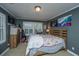 Comfortable bedroom with a bed, a chest of drawers, two windows letting in lots of light, and light-toned carpet at 562 Fort Johnson Rd, Charleston, SC 29412
