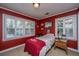 Bedroom features a window letting in plenty of light, red walls, and light-toned carpet at 562 Fort Johnson Rd, Charleston, SC 29412