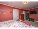 Comfortable bedroom featuring a window, a closet, a TV, and a dresser at 562 Fort Johnson Rd, Charleston, SC 29412