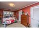 Cozy bedroom with a dresser, a window letting in plenty of light, and neutral-toned carpet at 562 Fort Johnson Rd, Charleston, SC 29412