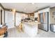 Bright kitchen featuring white cabinetry, stainless steel appliances, and a breakfast bar area at 562 Fort Johnson Rd, Charleston, SC 29412