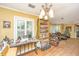 Cozy living room featuring a bookshelf, charming decor, and a comfortable seating area at 562 Fort Johnson Rd, Charleston, SC 29412