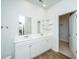 Bright bathroom features a double vanity with plentiful storage and an adjacent walk-in closet at 607 Silver Spruce St, Summerville, SC 29486