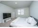 Comfortable bedroom is furnished with natural light and neutral colors for a serene living space at 607 Silver Spruce St, Summerville, SC 29486