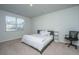 Bedroom with natural light features a cozy bed and neutral decor for relaxation at 607 Silver Spruce St, Summerville, SC 29486