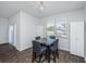 Dining area with view features modern table and chairs with stylish light fixture above at 607 Silver Spruce St, Summerville, SC 29486