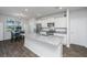 Eat-in kitchen features granite countertops, stainless appliances, and water view at 607 Silver Spruce St, Summerville, SC 29486