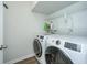 Laundry room equipped with a washer and dryer, and wire shelving for storage at 607 Silver Spruce St, Summerville, SC 29486