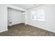 Inviting living room with light walls, wood-look floors, and plenty of natural light at 607 Silver Spruce St, Summerville, SC 29486