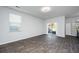 Open floor plan with large windows and sliding glass door to outdoor space at 607 Silver Spruce St, Summerville, SC 29486