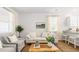 Cozy living area with bright windows, comfortable seating, and natural light at 6226 Gritman Dr, Hollywood, SC 29470