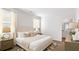 Comfortable main bedroom featuring hardwood floors, bedside tables, and a conveniently located bathroom at 6226 Gritman Dr, Hollywood, SC 29470