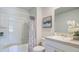 Bright bathroom featuring an above-mount sink, a shower tub combo and decorative accents at 6234 Gritman Dr, Hollywood, SC 29470