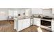 Well-designed kitchen with an island, granite countertops, and modern appliances at 6257 Gritman Dr, Hollywood, SC 29470