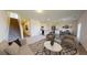 Inviting living space featuring modern furnishings, a staircase, and an open-concept layout at 717 Pisces Ln, Summerville, SC 29486