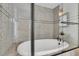 Modern bathroom showcasing a glass-enclosed shower/tub combo with stylish tile work and fixtures at 741 Creekside Dr, Mount Pleasant, SC 29464