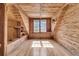 Bright bedroom with vaulted wood ceilings, hardwood floors and window with great natural light at 741 Creekside Dr, Mount Pleasant, SC 29464