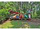 Outdoor canoe rack in a lush, green recreational area, perfect for waterfront living at 741 Creekside Dr, Mount Pleasant, SC 29464