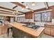 Spacious kitchen island featuring a gas stovetop and a breakfast bar area for seating at 741 Creekside Dr, Mount Pleasant, SC 29464