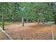 Community playground with multiple swing sets, slides, and play structures for children to enjoy at 741 Creekside Dr, Mount Pleasant, SC 29464