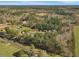 Overview of an expansive rural landscape with forests, fields, and scattered homes at 760 Community Ave, Smoaks, SC 29481