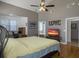 Primary bedroom has high ceilings with an attached office and ensuite bathroom at 760 Community Ave, Smoaks, SC 29481