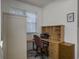 Office space with wooden desk and chair at 760 Community Ave, Smoaks, SC 29481