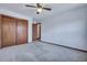 Bedroom featuring neutral walls, carpet, a window and closet at 7659 Allwood Ave, North Charleston, SC 29418