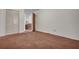 Bedroom with carpeted flooring, closet and doorway to hallway at 7659 Allwood Ave, North Charleston, SC 29418