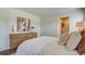 Cozy bedroom with a comfortable bed, a dresser, and an adjacent bathroom at 8018 Rackham Rd, Hollywood, SC 29470