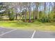 Community picnic area with mature trees and lush greenery, perfect for outdoor gatherings at 8506 Kennestone Ln, North Charleston, SC 29420