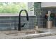 Close up of kitchen sink with granite countertops and a stylish faucet at 914 King Richard Dr, Charleston, SC 29407