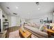 Spacious living room featuring an open floor plan and modern stainless steel appliances at 914 King Richard Dr, Charleston, SC 29407