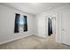 Neutral bedroom with carpet, black curtains, and a window at 103 Cotesworth Ct, Summerville, SC 29486
