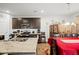 Well-equipped kitchen with granite countertops, stainless steel appliances, a kitchen island, and an adjacent dining area at 103 Cotesworth Ct, Summerville, SC 29486