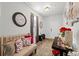 Inviting living room showcasing an ornate clock, console table, rug, and comfortable sofa with decorative pillows at 103 Cotesworth Ct, Summerville, SC 29486