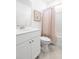 Clean bathroom with a tub and shower combo, single sink vanity, and neutral finishes at 1047 Tea Time Dr, Summerville, SC 29485