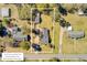 An aerial view displays the layout of the home on its lot, with neighboring houses and general surrounding area at 107 Minus St, Saint George, SC 29477