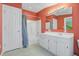 Well-lit bathroom with a shower-tub combo and a white vanity at 107 Minus St, Saint George, SC 29477
