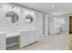 Spacious bathroom featuring double vanities, recessed lighting, and white cabinets at 107 Minus St, Saint George, SC 29477