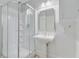 Well-lit bathroom with a stand-up shower and pedestal sink at 107 Minus St, Saint George, SC 29477