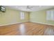 Spacious bedroom with vinyl floors, neutral paint, a ceiling fan, and natural light at 107 Minus St, Saint George, SC 29477